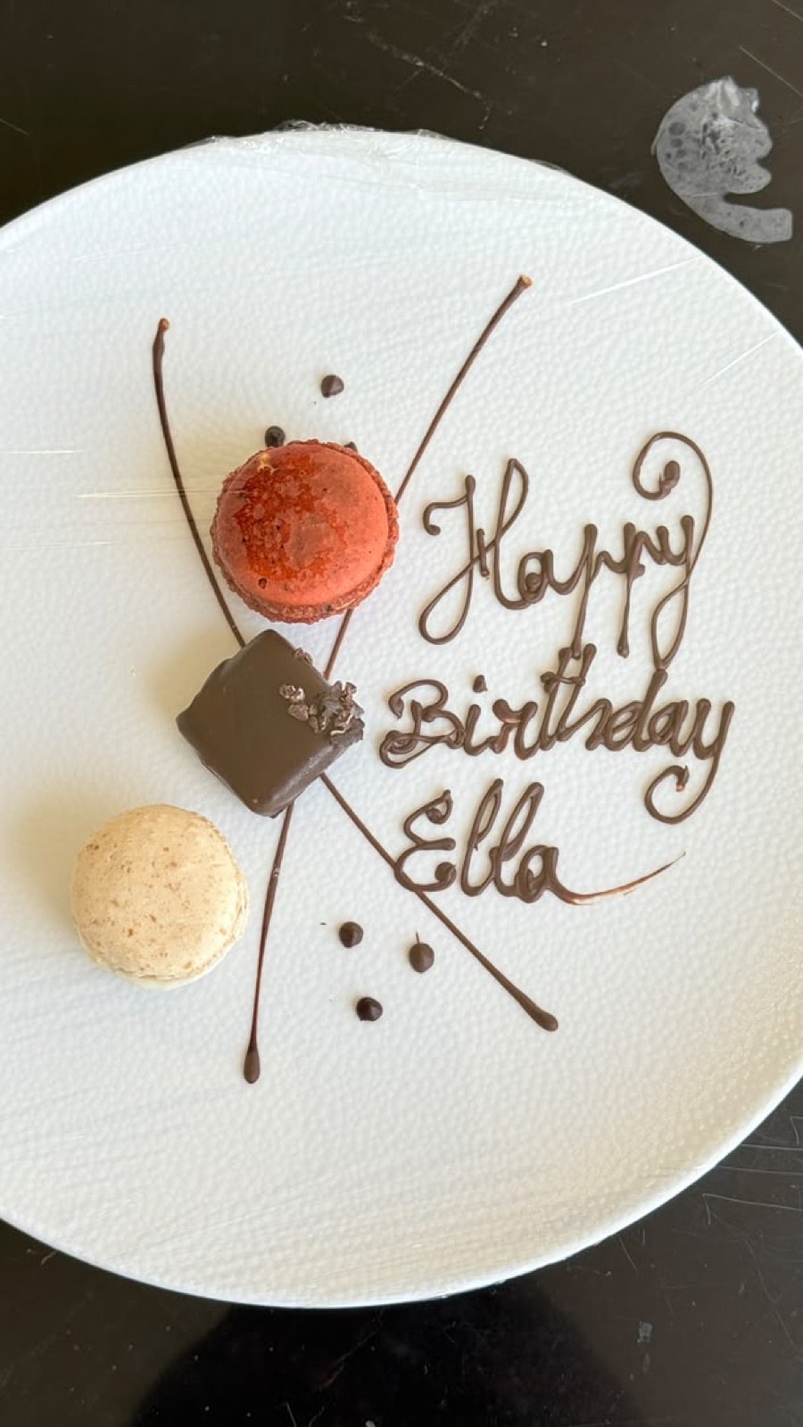 A Happy Birthday Ella patisserie plate with macarons